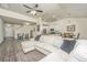 Open concept living room featuring hardwood floors, stylish decor, and a comfortable sofa at 409 Carousel Ct, Summerville, SC 29483