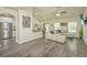Open living space featuring hardwood floors, a modern kitchen, and comfortable seating at 409 Carousel Ct, Summerville, SC 29483
