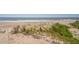 Sandy beach landscape with dunes and ocean waves in the background at 412 Palmetto Blvd, Edisto Island, SC 29438