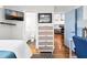 Cozy bedroom with hardwood floors, a view to other parts of the house, and a flatscreen TV at 412 Palmetto Blvd, Edisto Island, SC 29438