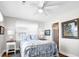 Serene bedroom with a comfortable bed, soft lighting, and tasteful decor for a restful retreat at 412 Palmetto Blvd, Edisto Island, SC 29438
