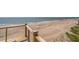 Expansive deck overlooking the sandy beach and ocean, perfect for outdoor relaxation and entertaining at 412 Palmetto Blvd, Edisto Island, SC 29438