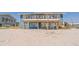 Beach house with a spacious deck, elevated design, and direct beach access at 412 Palmetto Blvd, Edisto Island, SC 29438