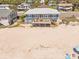 Charming beachfront home with a spacious deck and stunning ocean views at 412 Palmetto Blvd, Edisto Island, SC 29438