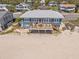 Beachfront home with a spacious deck overlooking the ocean and direct access to the sandy beach at 412 Palmetto Blvd, Edisto Island, SC 29438