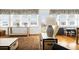 Cozy living area with large windows offering stunning ocean views and stylish furnishings at 412 Palmetto Blvd, Edisto Island, SC 29438