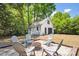 Charming garage with a fire pit and multiple chairs perfect for enjoying the outdoors at 4503 Overbrook Ave, North Charleston, SC 29405