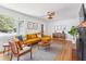 Cozy living area with large window, stylish furniture and hardwood flooring at 4503 Overbrook Ave, North Charleston, SC 29405