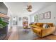 Open living space with seamless flow into dining, featuring warm hardwood floors at 4503 Overbrook Ave, North Charleston, SC 29405