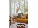 Comfortable living room featuring a window, stylish couch and modern decor at 4503 Overbrook Ave, North Charleston, SC 29405