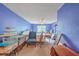 Bedroom view showcasing natural lighting, storage containers, and cozy ceiling fan at 4942 Storage Rd, Meggett, SC 29449
