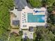 Aerial view of community pool with lap lanes, lounging area, and playground at 501 Willow Branch Way, Mount Pleasant, SC 29464