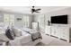 Spacious bedroom featuring natural light, dresser, and a television at 501 Willow Branch Way, Mount Pleasant, SC 29464