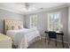 Comfortable bedroom with a desk and natural light at 501 Willow Branch Way, Mount Pleasant, SC 29464