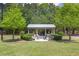 Community fire pit area with seating, providing a relaxing gathering spot at 501 Willow Branch Way, Mount Pleasant, SC 29464