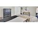 Relaxing bedroom with a modern dresser, comfy rug, and plenty of closet space at 5029 Victoria Ave, North Charleston, SC 29405
