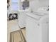 Bright laundry room with new, modern washer and dryer at 5029 Victoria Ave, North Charleston, SC 29405
