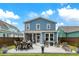 Serene backyard with outdoor seating, a lush lawn, and attractive landscaping at 518 Sound Dr, Summerville, SC 29486