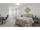 Comfortable bedroom with carpet, a cozy bed, desk, and a decorative wall hanging at 518 Sound Dr, Summerville, SC 29486