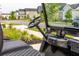 View from golf cart seat, showing dash and steering wheel on a residential street at 518 Sound Dr, Summerville, SC 29486