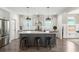 Bright kitchen features a large island, stainless appliances, and ample counter space at 518 Sound Dr, Summerville, SC 29486