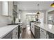 Contemporary kitchen with stainless steel appliances, sleek countertops, and lots of natural light at 518 Sound Dr, Summerville, SC 29486
