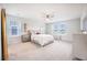 Spacious bedroom with a ceiling fan, large windows, and stylish furniture at 533 Richfield Way, Summerville, SC 29486