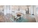 Dining room features hardwood floors, modern furnishings, and an open view to the kitchen at 533 Richfield Way, Summerville, SC 29486