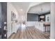 Elegant dining room showcasing stylish flooring, a modern chandelier, and an open doorway at 533 Richfield Way, Summerville, SC 29486