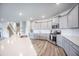 Open kitchen featuring gray cabinets, white countertops, stainless steel appliances, and a kitchen island at 533 Richfield Way, Summerville, SC 29486