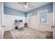 Bright office with a ceiling fan, wainscotting, a desk setup, and natural light from large windows at 533 Richfield Way, Summerville, SC 29486