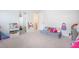 Playroom area with cozy seating and fun decorations at 533 Richfield Way, Summerville, SC 29486