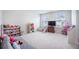 Bright and spacious playroom with a tv and lots of toys at 533 Richfield Way, Summerville, SC 29486