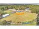 Expansive aerial view showcasing the community baseball field with well-maintained facilities for sports and recreation at 5737 Dewsbury Ln, North Charleston, SC 29418