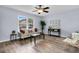 Bright living room featuring a large window and neutral colors at 5737 Dewsbury Ln, North Charleston, SC 29418