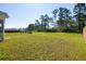 An expansive yard is surrounded by trees at 603 Yellow Leaf Ln, Summerville, SC 29486