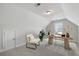 A staged bedroom features neutral carpet, an exterior window and an office setup at 603 Yellow Leaf Ln, Summerville, SC 29486