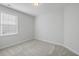 Sunny bedroom with natural light, neutral walls, and plush carpeting for a cozy feel at 603 Yellow Leaf Ln, Summerville, SC 29486