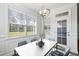 Bright breakfast nook features large windows and access to the backyard at 603 Yellow Leaf Ln, Summerville, SC 29486