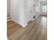 Inviting hallway with luxury vinyl flooring, coat closet and natural light from the front door at 603 Yellow Leaf Ln, Summerville, SC 29486