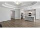 Bright, open-concept kitchen with stainless steel appliances and a center island at 603 Yellow Leaf Ln, Summerville, SC 29486