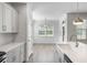 Bright kitchen with stainless steel appliances, granite countertops, and an island at 603 Yellow Leaf Ln, Summerville, SC 29486