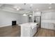 Spacious living area boasts a cozy fireplace and an open layout to the kitchen at 603 Yellow Leaf Ln, Summerville, SC 29486