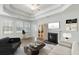 Bright living room with trey ceiling, fireplace, and stylish decor, creating a welcoming atmosphere at 603 Yellow Leaf Ln, Summerville, SC 29486