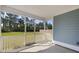 This screened in patio offers an unobstructed view to the backyard at 603 Yellow Leaf Ln, Summerville, SC 29486