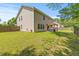 Beautiful backyard with a pergola, fenced yard, and plenty of green space at 606 Knowledge Dr, Ladson, SC 29456