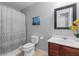 Traditional bathroom featuring a shower with a curtain, a vanity, and tiled floors at 606 Knowledge Dr, Ladson, SC 29456