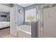 An airy bathroom features a soaking tub with natural light and a separate shower at 606 Knowledge Dr, Ladson, SC 29456