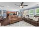 The living room is open to the kitchen and features hardwood floors, a ceiling fan, and recessed lighting at 606 Knowledge Dr, Ladson, SC 29456