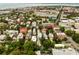 Aerial view showing the city and the surrounding landscape with lots of trees at 62 Society St, Charleston, SC 29401
